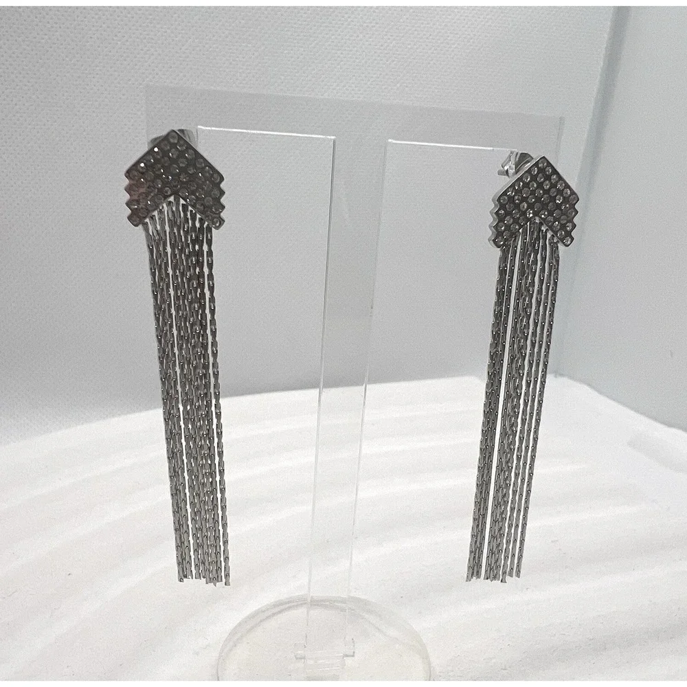 Long‎ earrings with chain fringes and rhinestones.